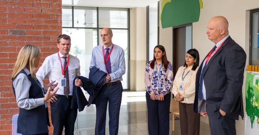 Leaders from Bedford School Mohali and Bedford School UK discussing school performance and improvement.