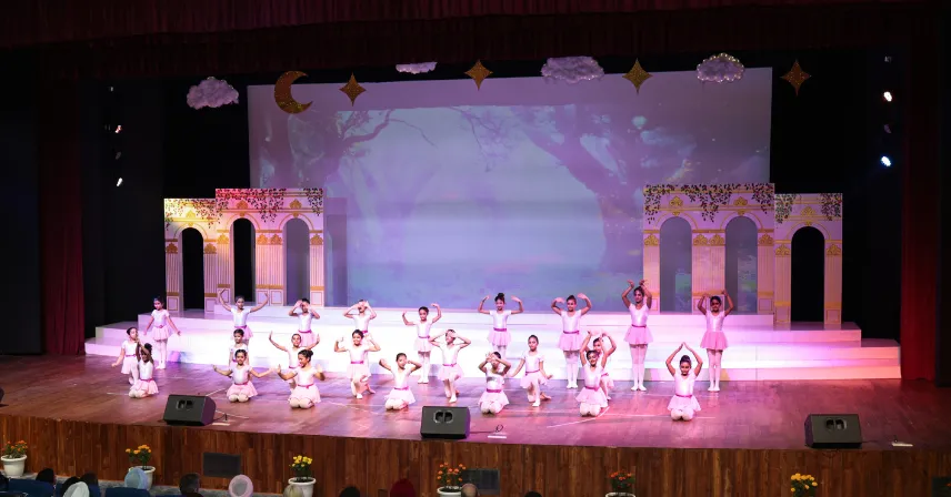 Pupils of Bedford School Mohali performing a synchronised dance on stage at The Mann Theatre⁠.